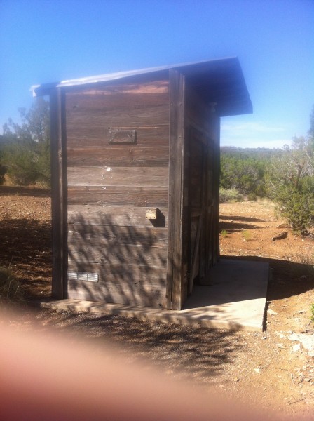 Men's outhouses at the schoolhouse.