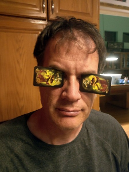 My "Goggles of Shame" after losing badly in game one.  These are victory point reduction cards Grant kindly gave me to add to my pain.