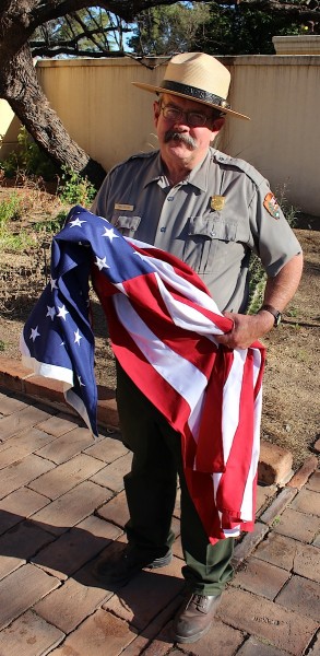 Rick Collins, park ranger and Anza enthusiast, lets me interrupt his day-end flag duties for a photo. Tumacácori National Historical Park.